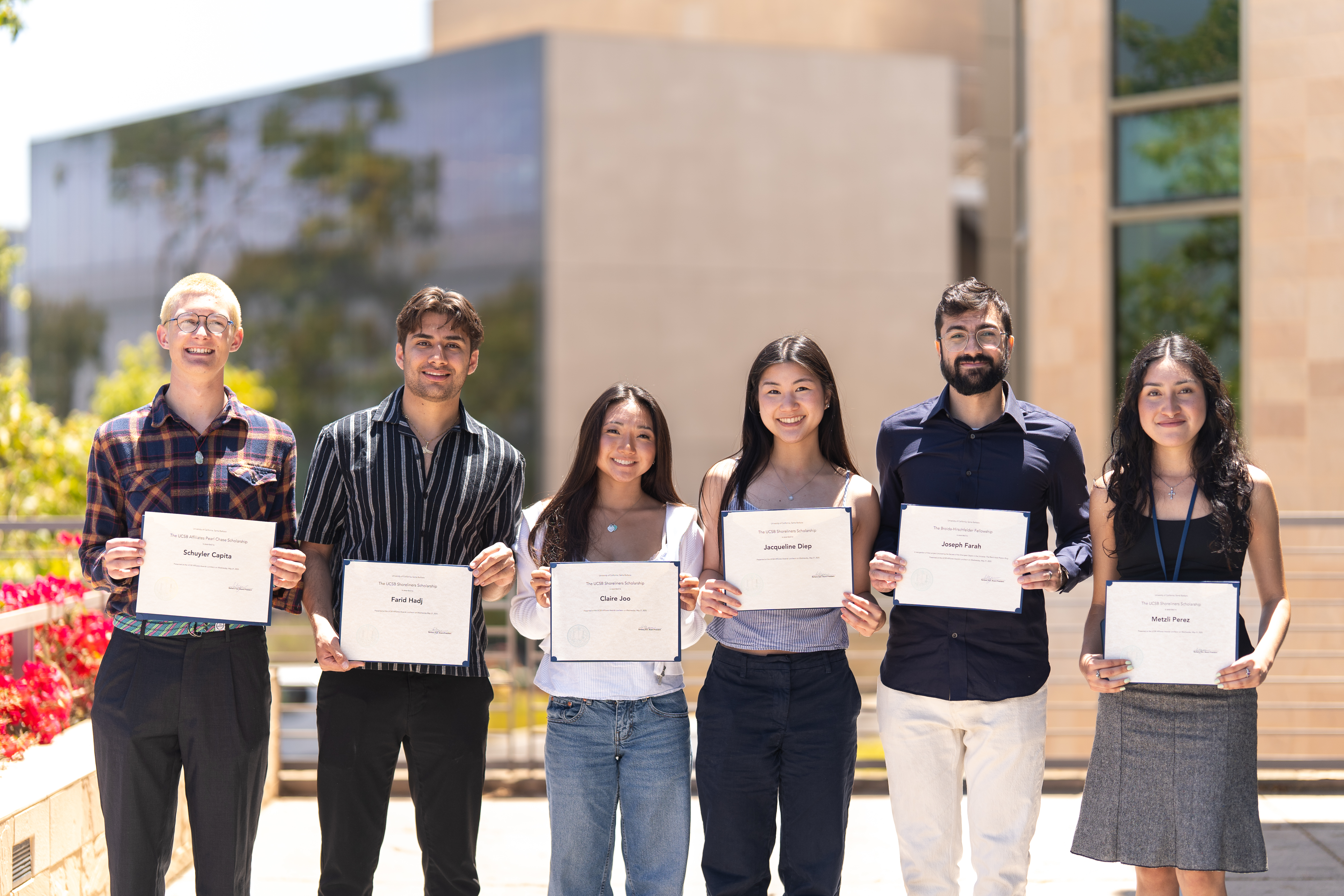 Students holding certificate